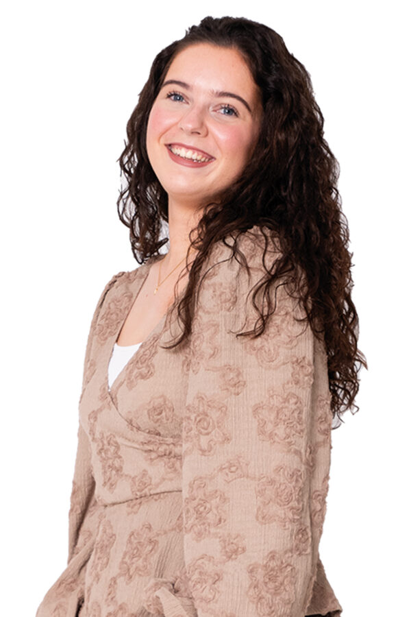 Jamie Vossen kijkt lachend naar de camera